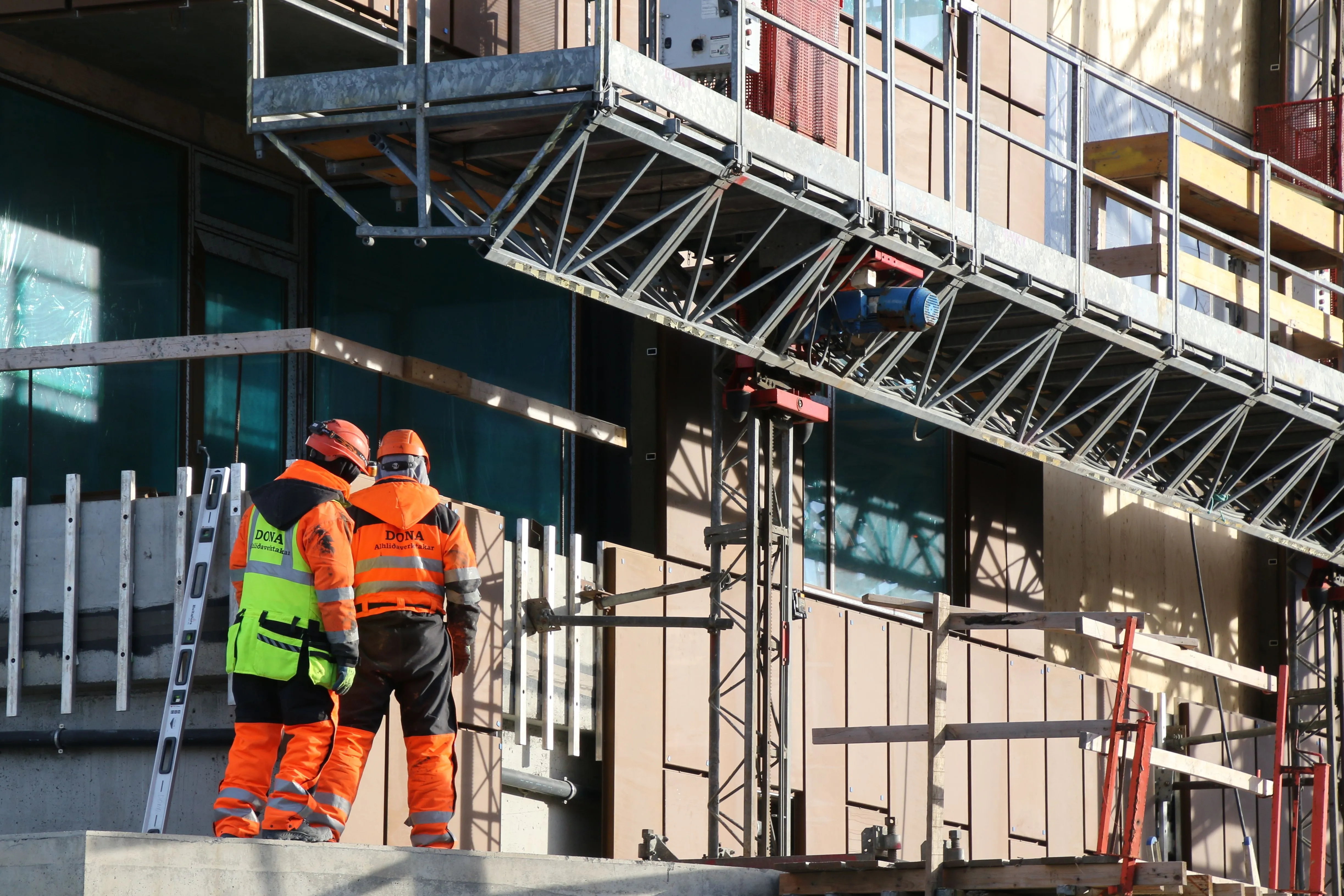 Photo of workers on scaffolding
